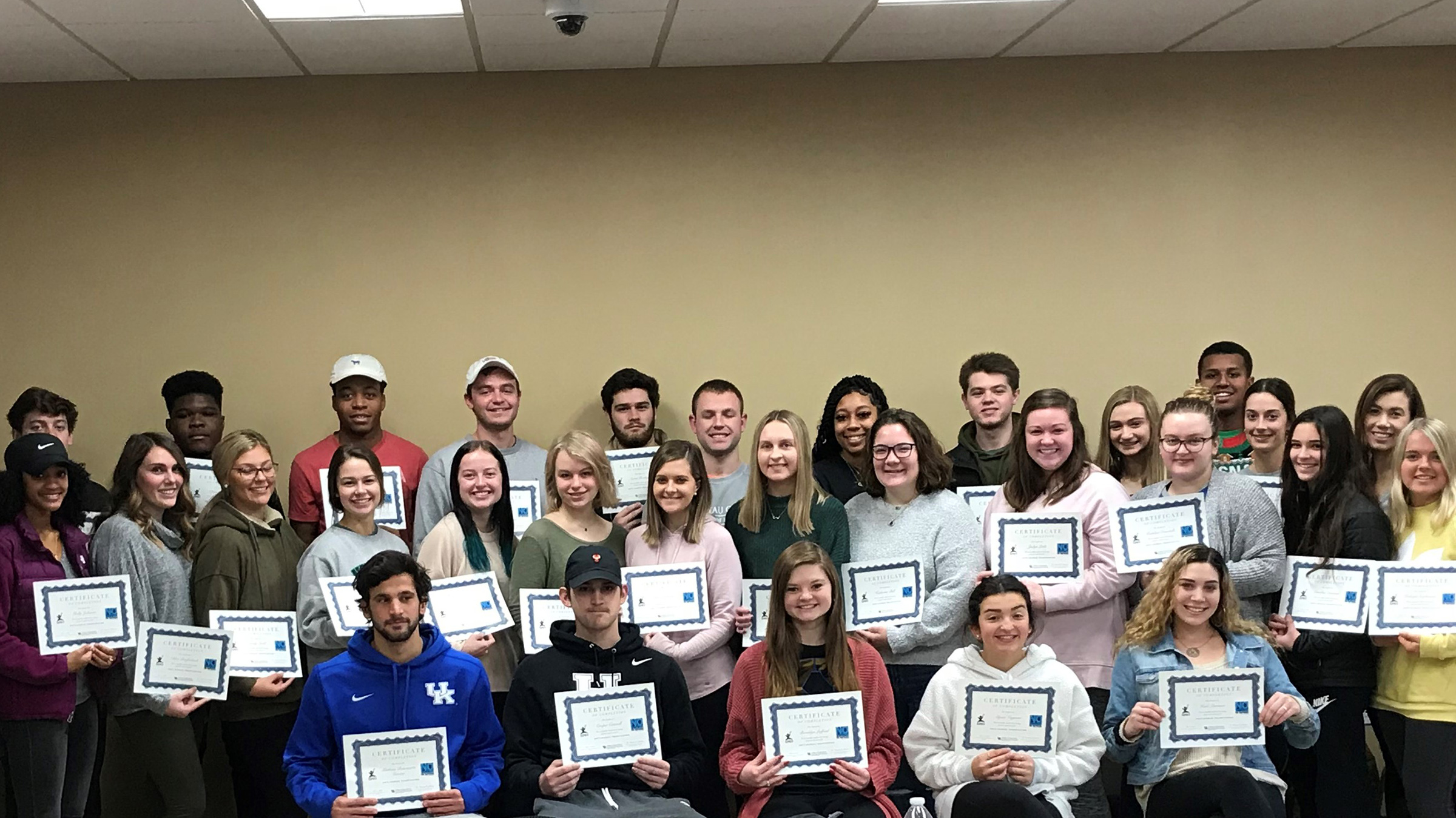 A group of students with their Human Trafficking Awareness certificates