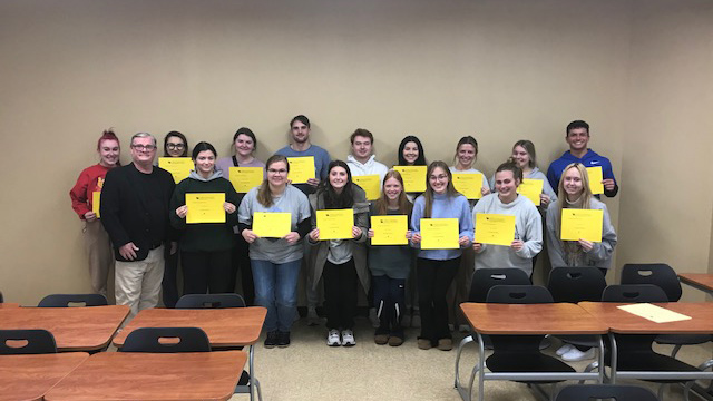 A group of students with their Google Sheets certificates