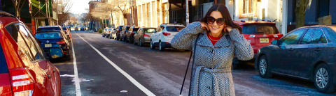 Woman walking across the street